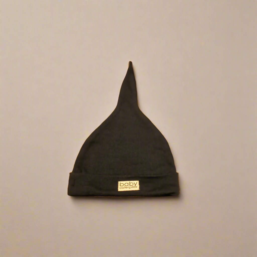 Black merino wool baby beanie, soft and breathable, made in New Zealand