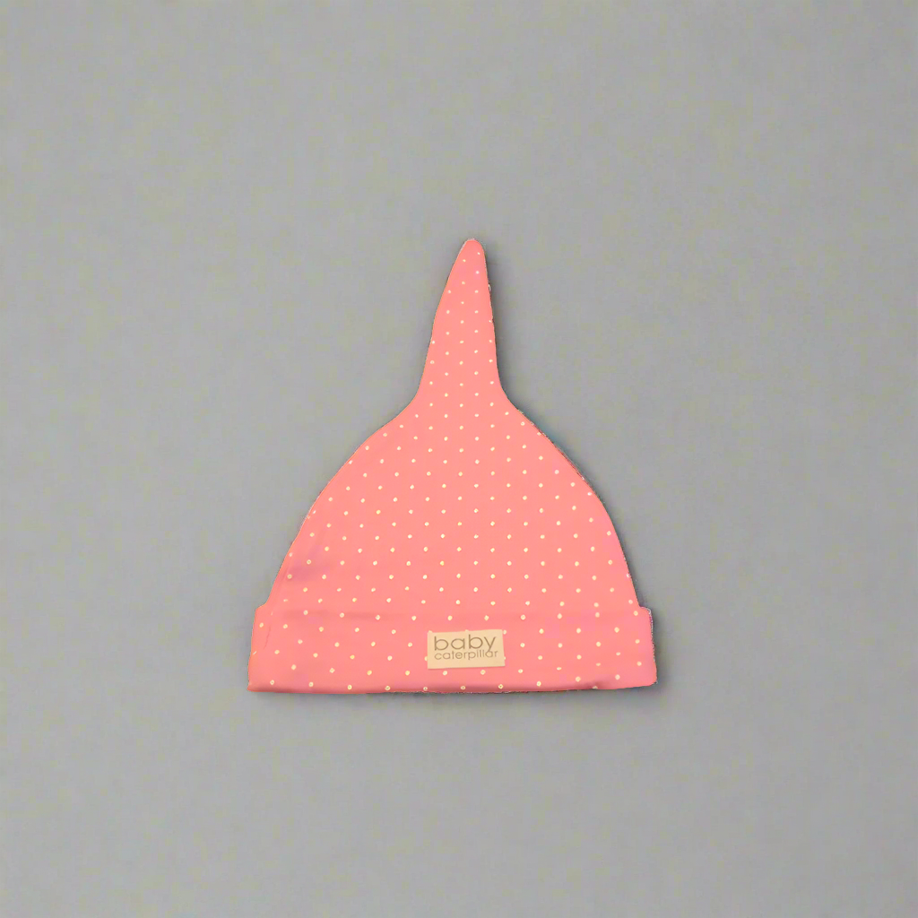 Pink polka dots merino wool baby beanie, soft and breathable, made in New Zealand