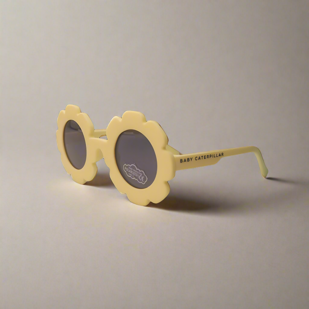 Baby Caterpillar Sunglasses in Daisy Yellow with flexible frame and UV-protective lenses, designed for ages 0–3 years