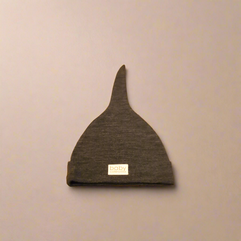 Charcoal grey merino wool baby beanie, soft and breathable, made in New Zealand