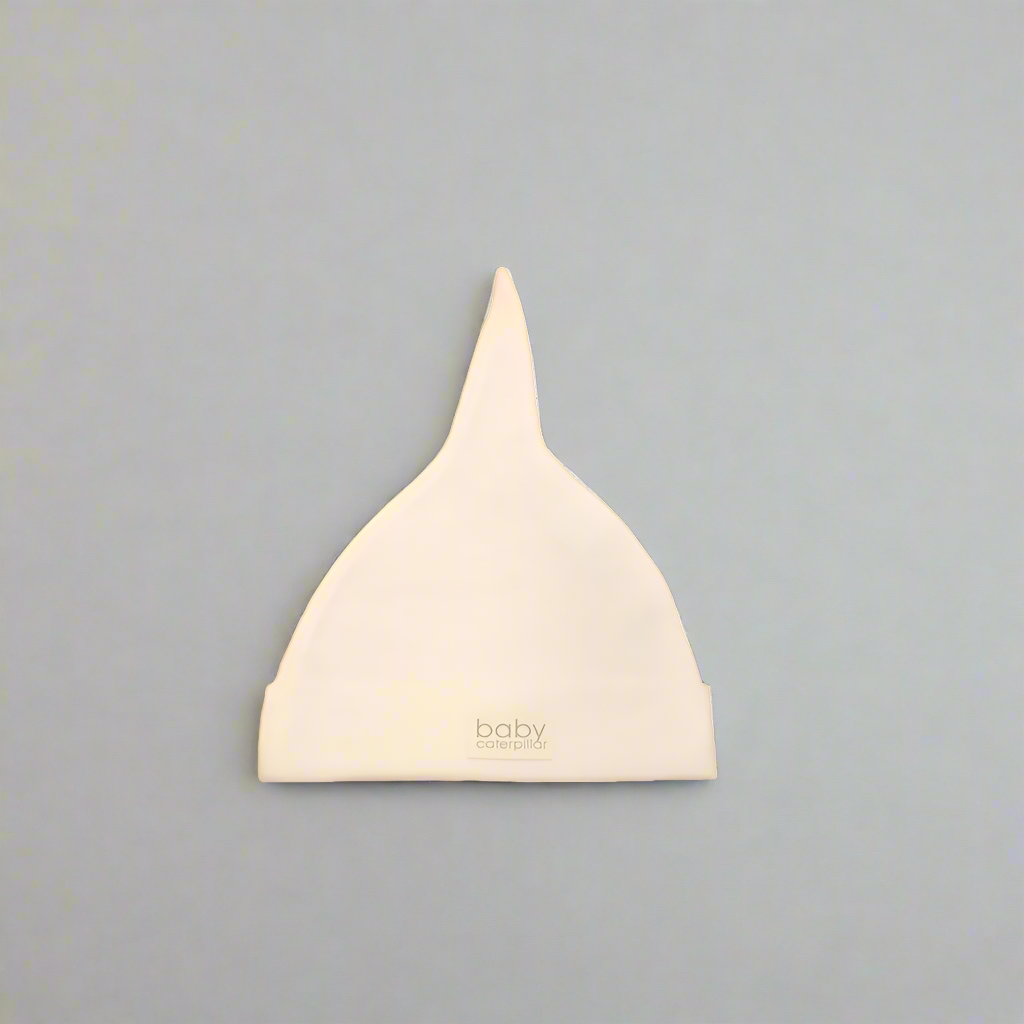 Cream merino wool baby beanie, soft and breathable, made in New Zealand