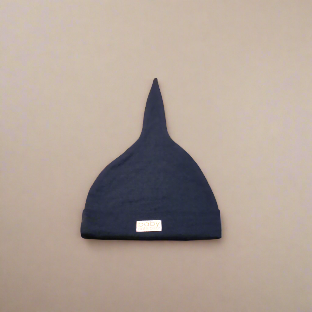 Navy blue merino wool baby beanie, soft and breathable, made in New Zealand