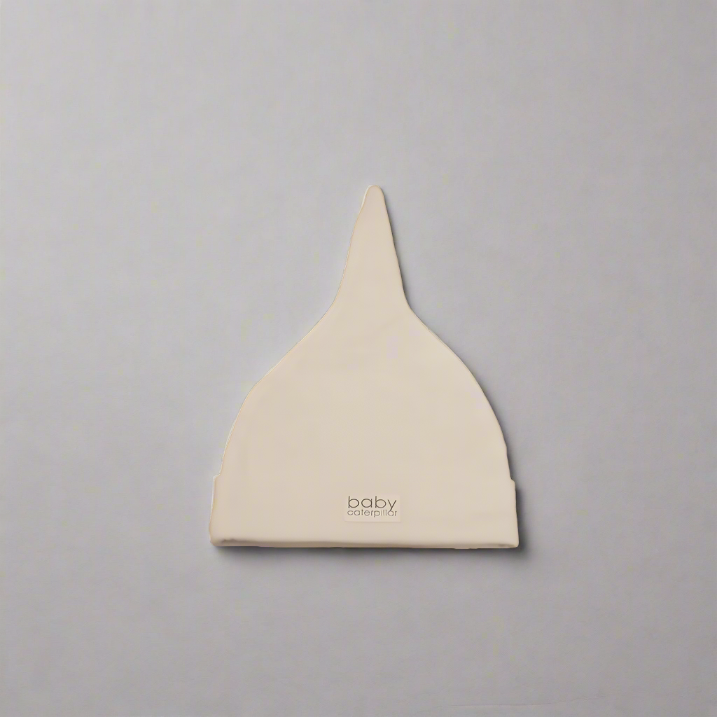 Oatmeal white merino wool baby beanie, soft and breathable, made in New Zealand
