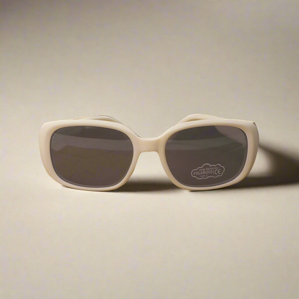 Baby Caterpillar Bubbles sunglasses in white with flexible frame and UV-protective lenses, designed for ages 0–6 years