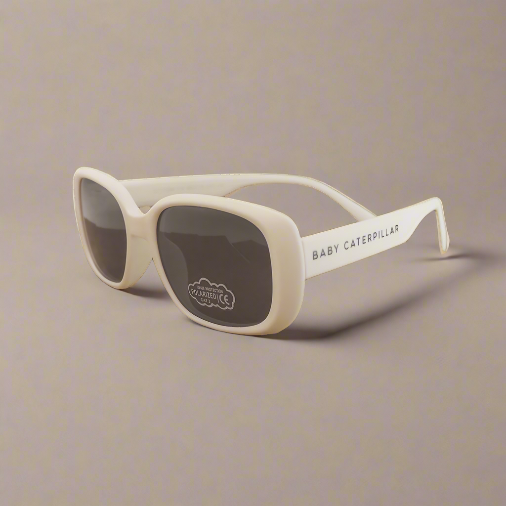 Baby Caterpillar Bubbles sunglasses in white with flexible frame and UV-protective lenses, designed for ages 0–6 years