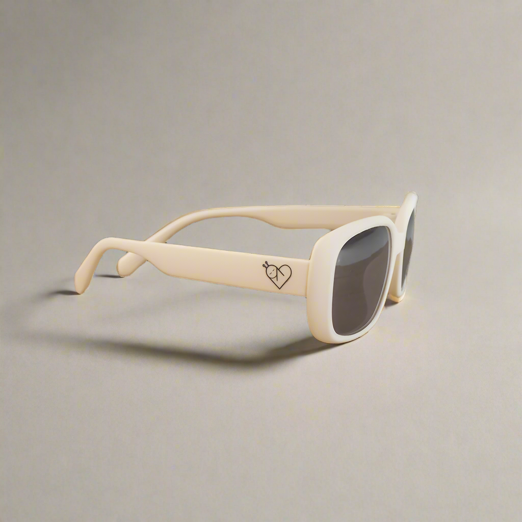 Baby Caterpillar Bubbles sunglasses in white with flexible frame and UV-protective lenses, designed for ages 0–6 years