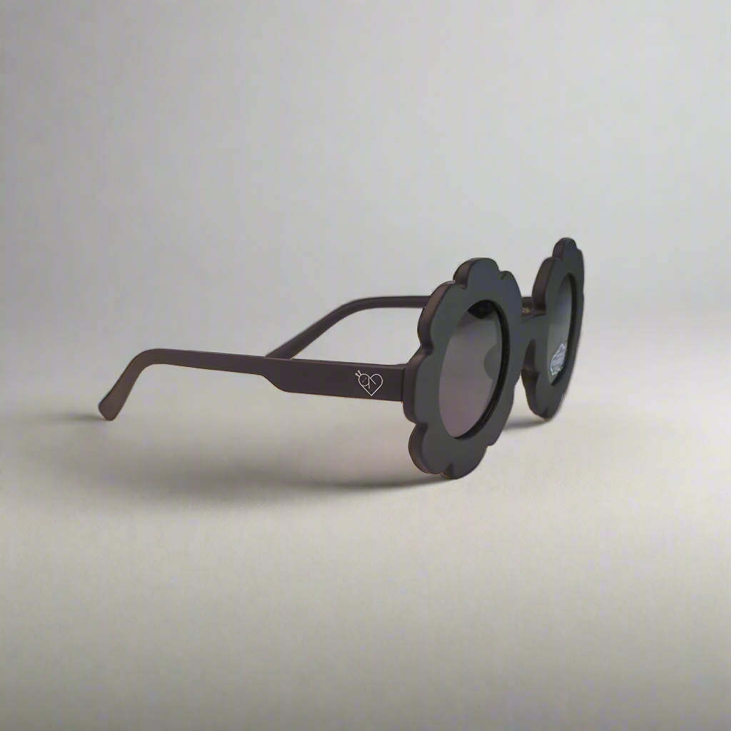 Baby Caterpillar Sunglasses in Daisy Black with flexible frame and UV-protective lenses, designed for ages 0–3 years