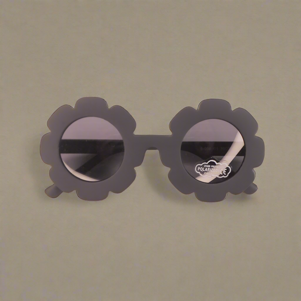 Baby Caterpillar Sunglasses in Daisy Black with flexible frame and UV-protective lenses, designed for ages 0–3 years