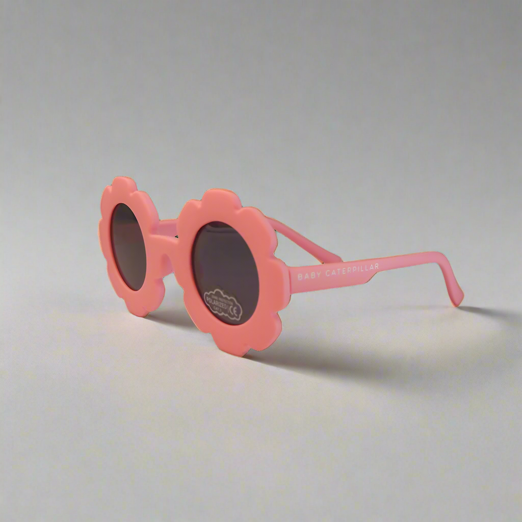 Baby Caterpillar Daisy sunglasses in Pink with flexible frame and UV-protective lenses, designed for ages 0–3 years