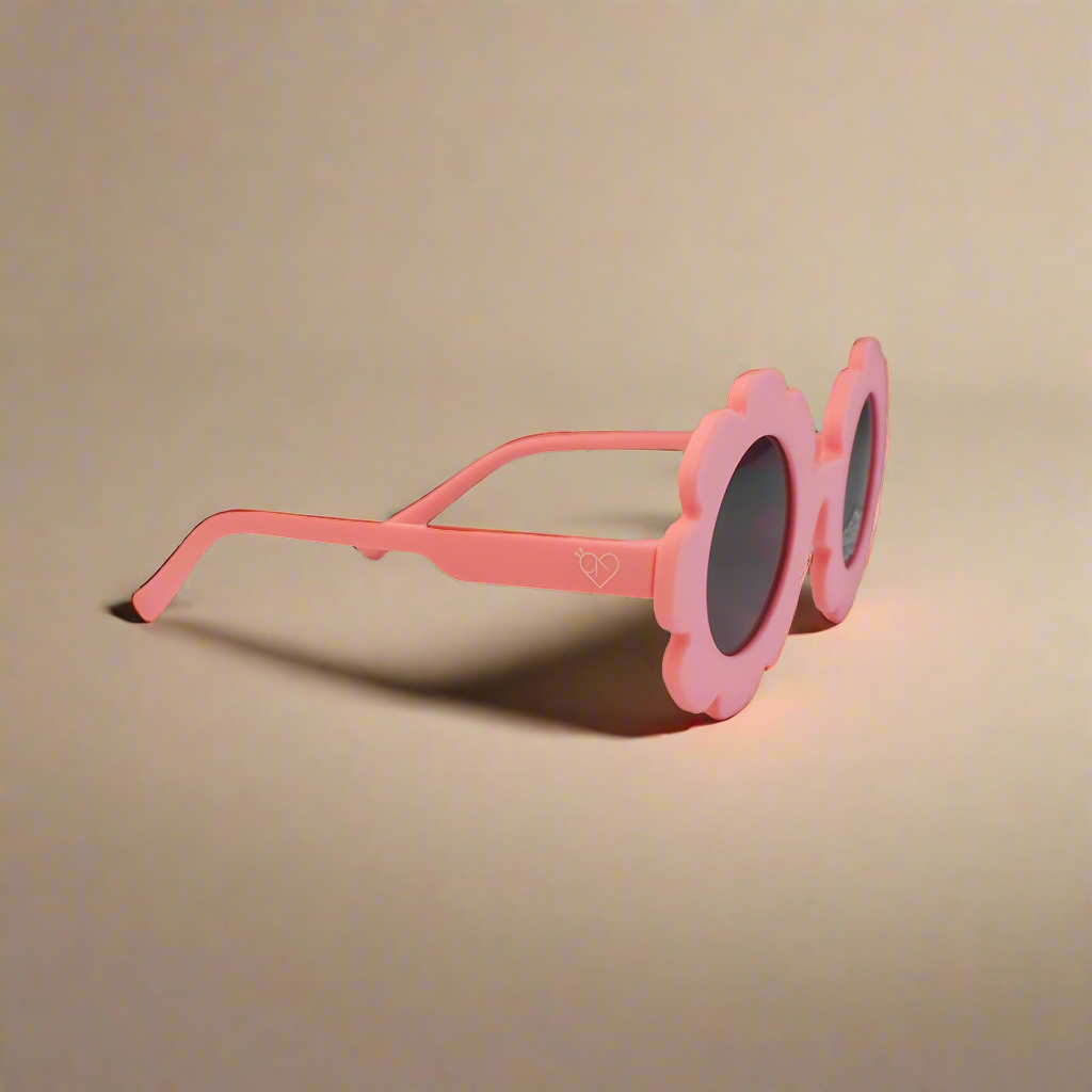 Baby Caterpillar Daisy sunglasses in Pink with flexible frame and UV-protective lenses, designed for ages 0–3 years