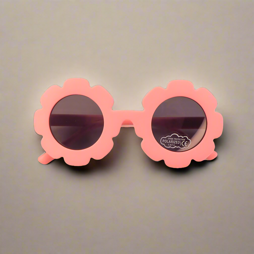 Baby Caterpillar Daisy sunglasses in Pink with flexible frame and UV-protective lenses, designed for ages 0–3 years
