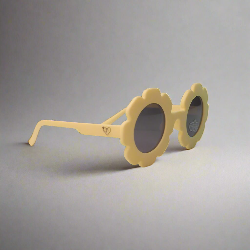 Baby Caterpillar Sunglasses in Daisy Yellow with flexible frame and UV-protective lenses, designed for ages 0–3 years